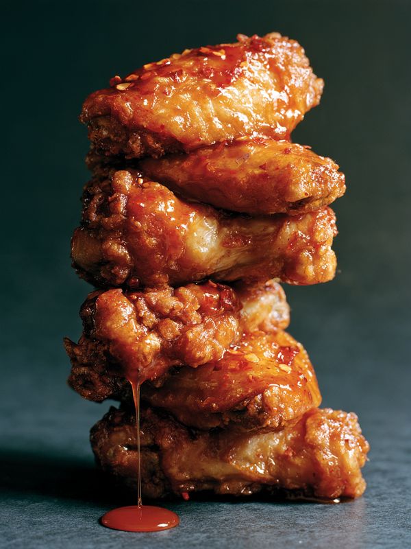 Stack of Nashville hot wings glazed in cayenne oil